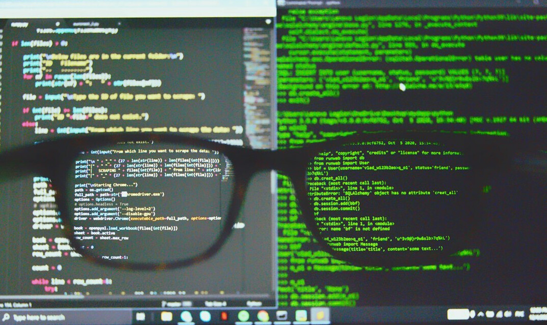 programmer writing insurance code